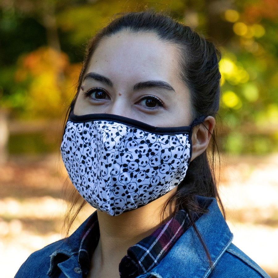 Panda print face mask modelled by an adult female